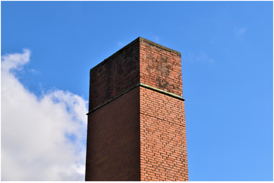 Large chimney made of bricks. 