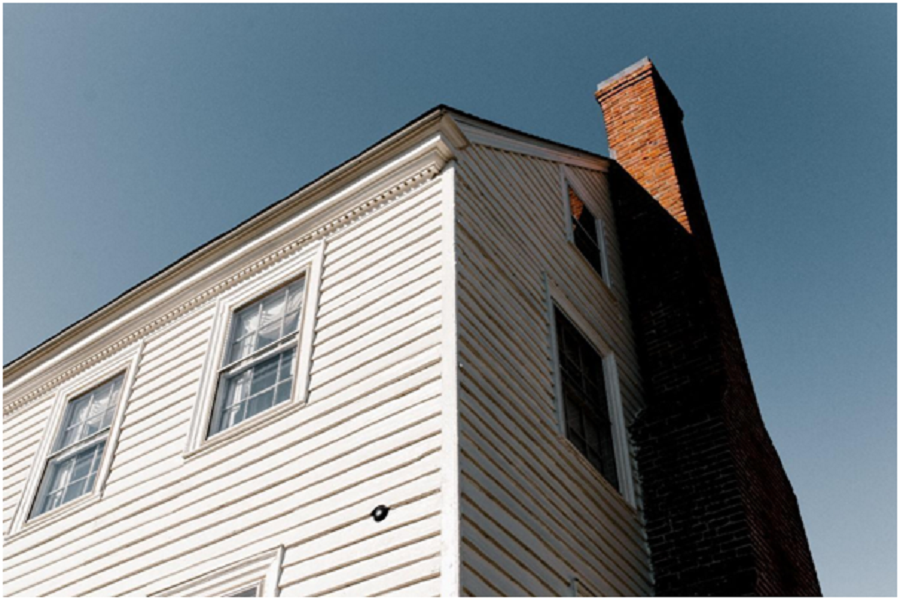 Brick chimney in a house. 